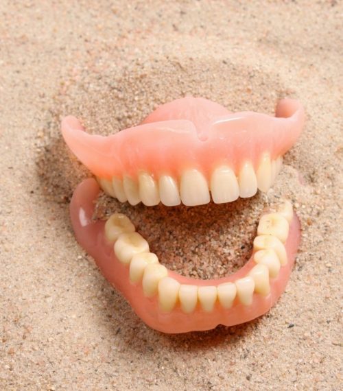 Denture in the sand